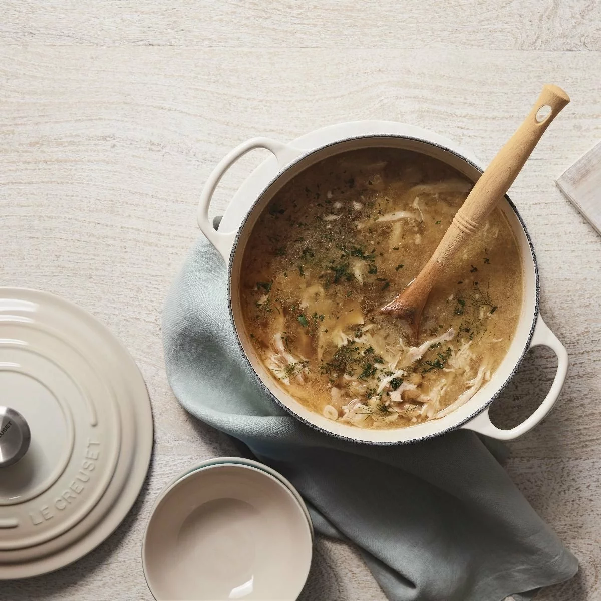 Le Creuset 5.5 Qt. Round Signature Cast Iron Dutch Oven With Stainless Steel Knob | Meringue White 5 Le Creuset 5.5 Qt. Round Signature Cast Iron Dutch Oven With Stainless Steel Knob | Meringue White - Image 3